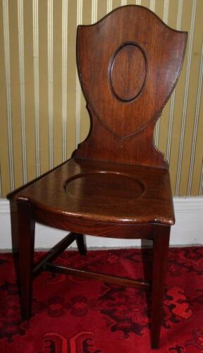 A George III mahogany hall chair