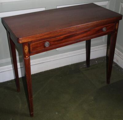An early 19thC mahogany tea table