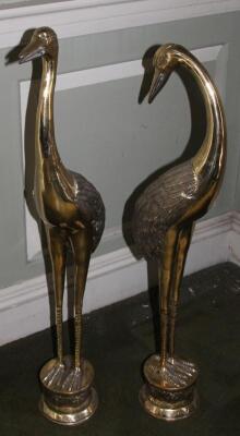 A pair of modern Chinese brass cranes