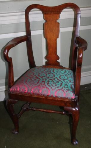 A walnut open armchair