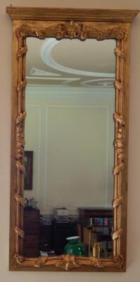 A pair of gilt gesso wall mirrors