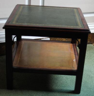 A mahogany two tier low table