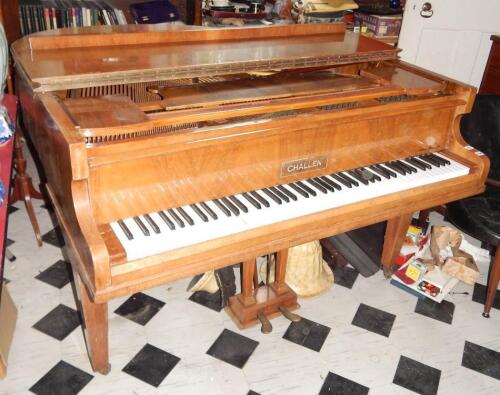 A Challen baby grand piano