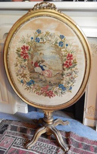 A 19thC giltwood and gesso fire screen