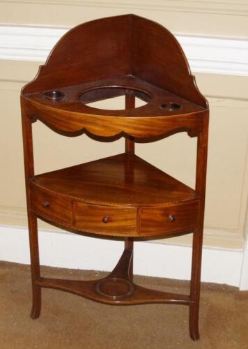 To GR270716. A George III mahogany and boxwood strung corner washstand