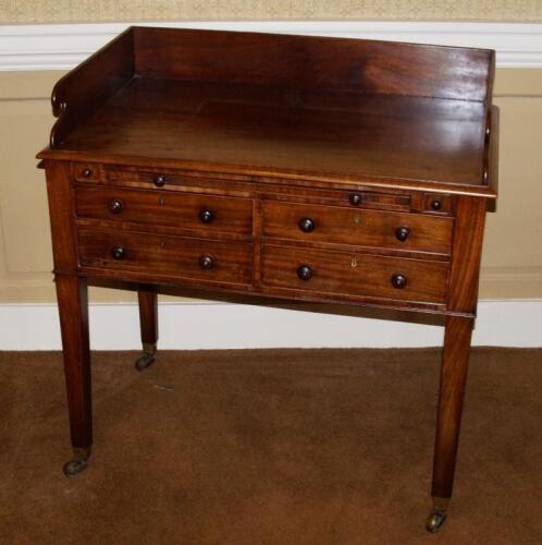 A late George III mahogany dressing table