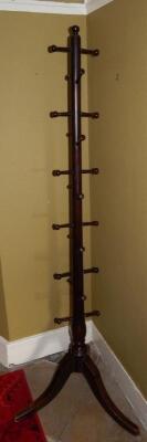 A turned mahogany hat and coat stand