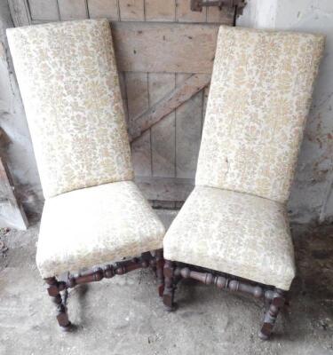 A pair of oak framed highback chairs