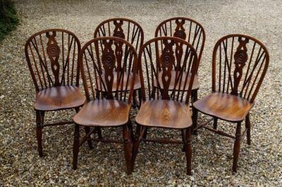 A set of six 19thC Thames Valley yew Windsor side chairs