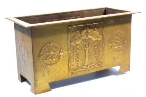 An Edwardian Arts & Crafts brass planter