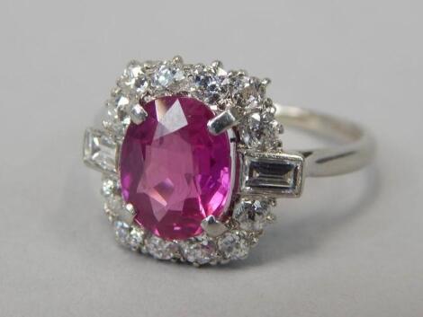 A ruby and diamond set dress ring