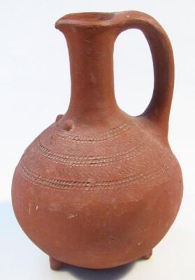 A 19thC red ware terracotta flagon