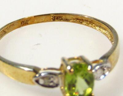 A ladies dress ring set with peridot and diamonds to the part pierced shank - 2