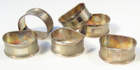 A set of six George VI silver napkin rings