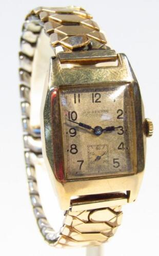 A gentleman's wristwatch by J W Benson