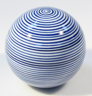 A 19thC blue and white porcelain carpet bowl style paperweight