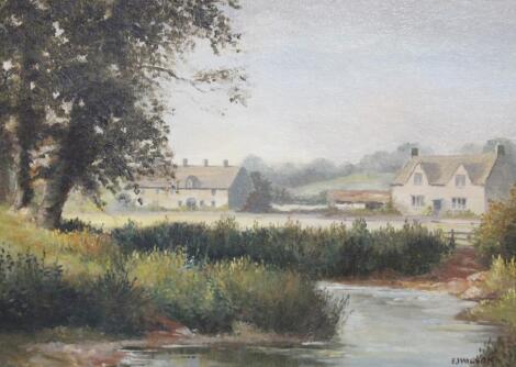 EJ Wilson (20thC). Stream before cottages and trees