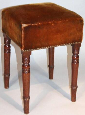 An Edwardian mahogany framed stool