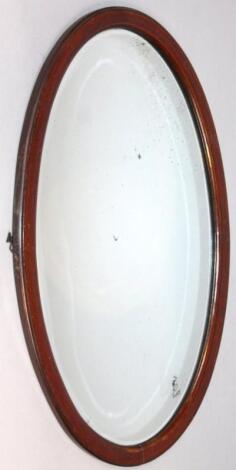 An Edwardian mahogany box wood and part inlaid mirror