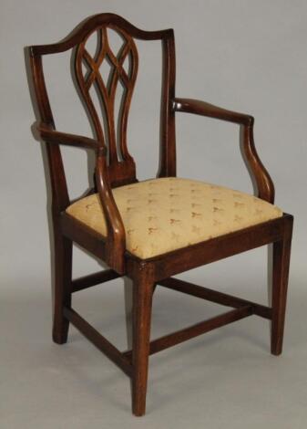 An early 19thC mahogany carver chair