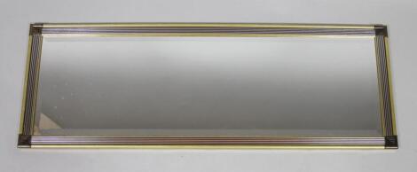 A rectangular wall mirror