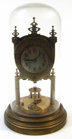 A 20thC brass anniversary skeleton style clock