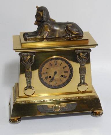 A 19thC gilt brass Egyptian Revival mantel clock