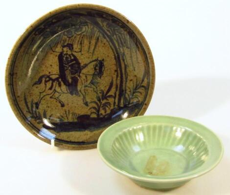 A Chinese celadon dished saucer