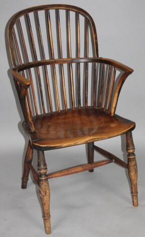 A 19thC hoop back Windsor chair