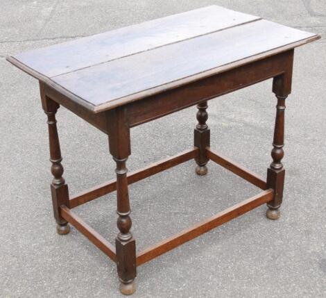 A Jacobean style oak side table