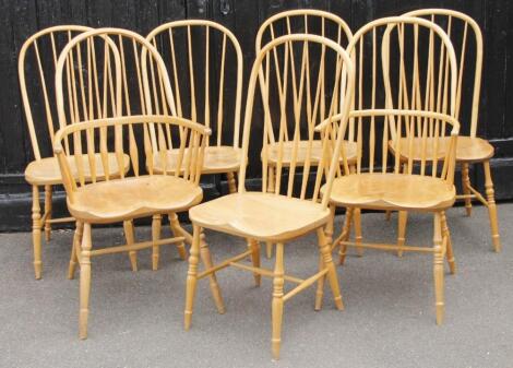 A set of seven spindle back hoop chairs