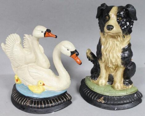 *Dog and swans door stops.