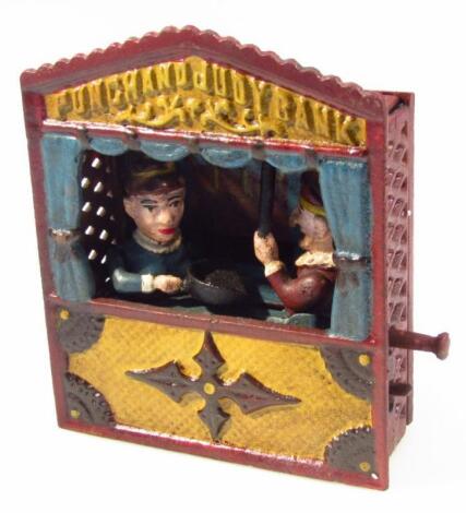 *A Punch & Judy mechanical bank.