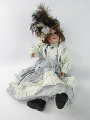 A Heubach bisque head doll