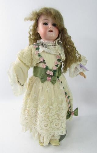 An Armand Marseilles Thorodora bisque head doll