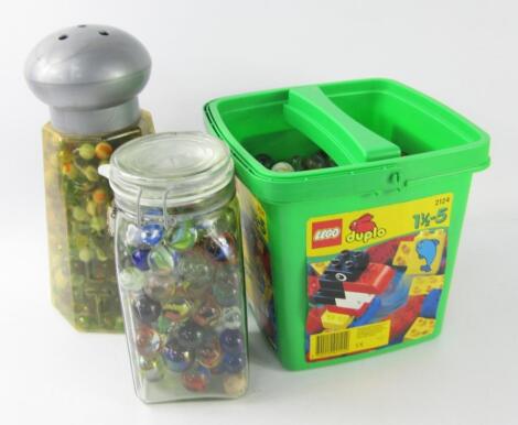 A box and two jars of marbles. (a quantity)