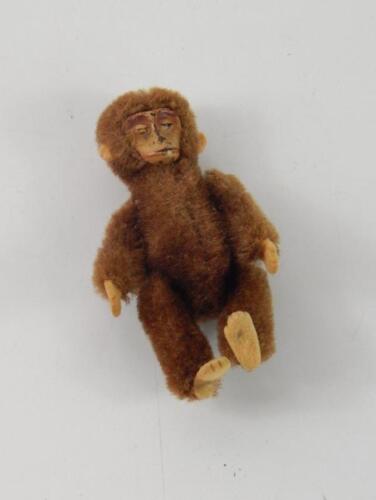 A Schuco miniature mohair monkey