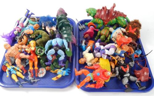 A collection of He-man figures by Mattel