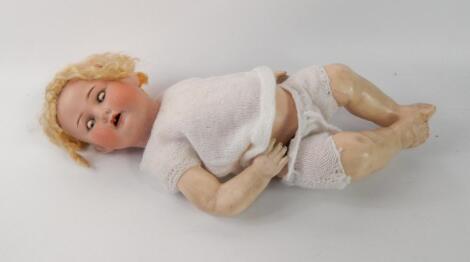 An Armand Marseilles bisque headed doll