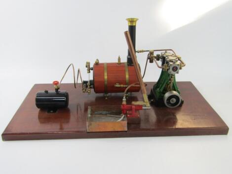 A Stuart live model steam standing engine