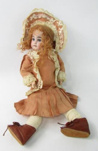 An Armand Marseilles bisque head doll 1894