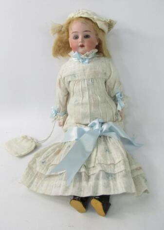 A Cuno & Otta Dressel bisque head doll