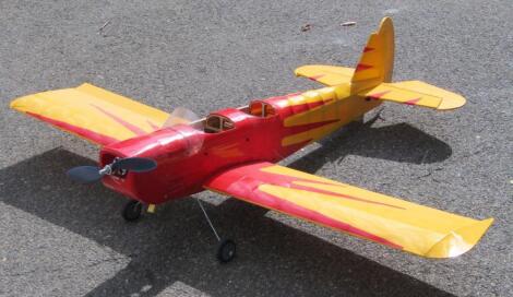 A remote controlled single propeller airplane