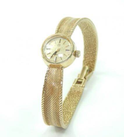 An Omega Lady's 9ct gold circular cased wristwatch