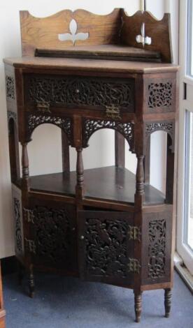 A Victorian oak corner display cabinet