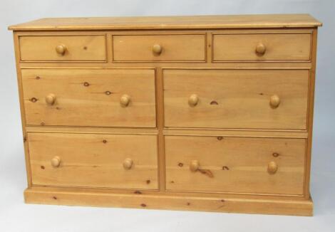 A pine chest of drawers