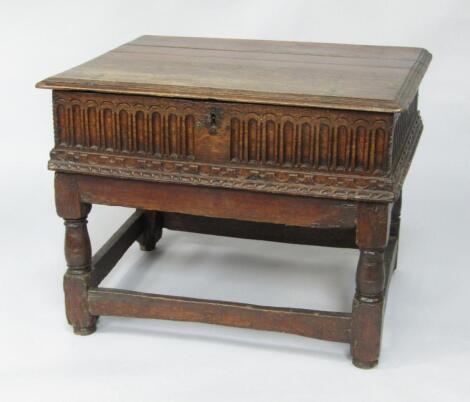 A 17thC oak bible box on stand