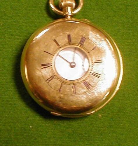 An 18ct gold half hunter pocket watch