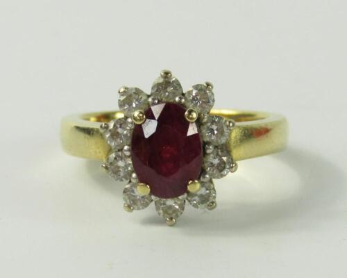 An 18ct gold ruby and diamond ring