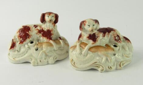 A pair of 19thC Staffordshire pottery inkwells